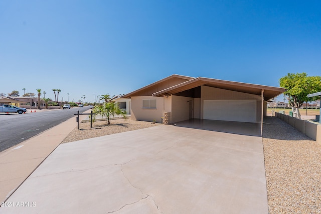 view of front facade featuring a carport