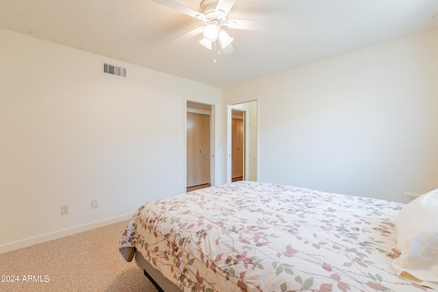 bedroom featuring ceiling fan and carpet flooring