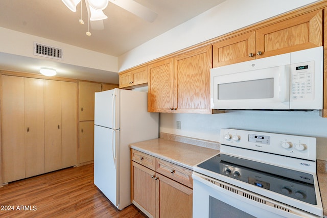 kitchen with light hardwood / wood-style floors, ceiling fan, light brown cabinetry, and white appliances