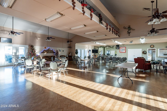 workout area with high vaulted ceiling