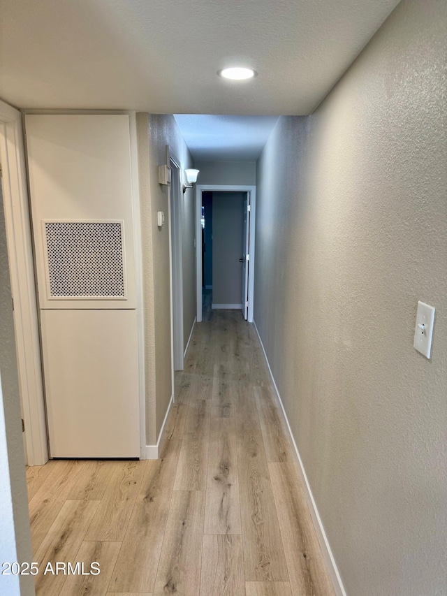 6810 N 35th Ave Unit H, Phoenix, AZ 85017 - hall with light wood-style floors and baseboards