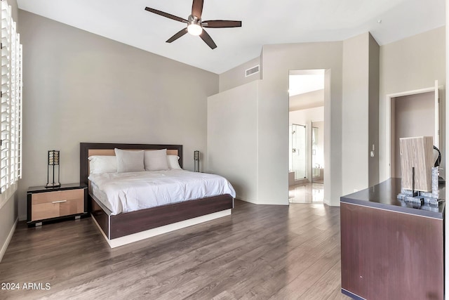 bedroom featuring ceiling fan and dark hardwood / wood-style floors