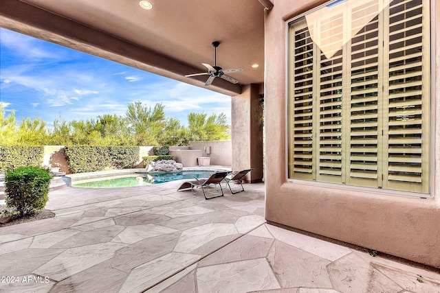 view of patio / terrace featuring a fenced in pool