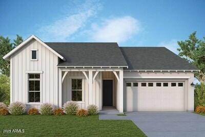 view of front facade with a garage and a front yard