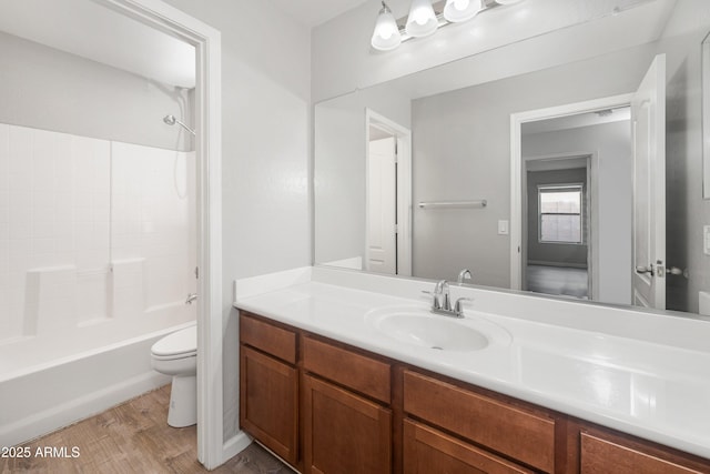 1015 E Penny Ln, San Tan Valley, AZ 85140 - full bathroom with toilet, vanity, wood finished floors, and shower / bath combination