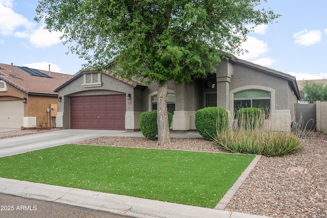 1015 E Penny Ln, San Tan Valley, AZ 85140 - single story home with stucco siding, an attached garage, concrete driveway, and a front yard