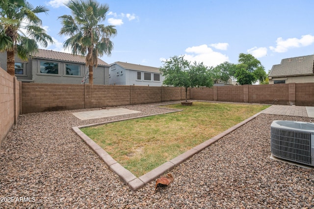 1015 E Penny Ln, San Tan Valley, AZ 85140 - view of yard with central AC and a patio