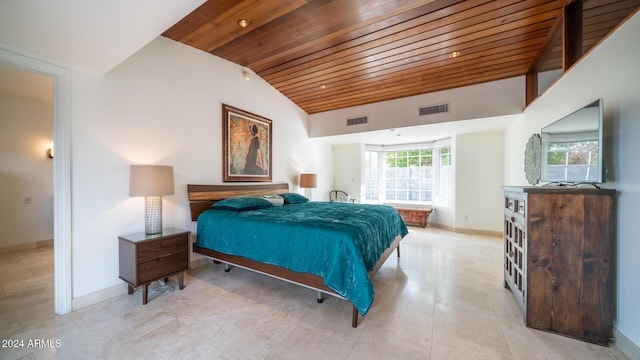 tiled bedroom with wooden ceiling and lofted ceiling