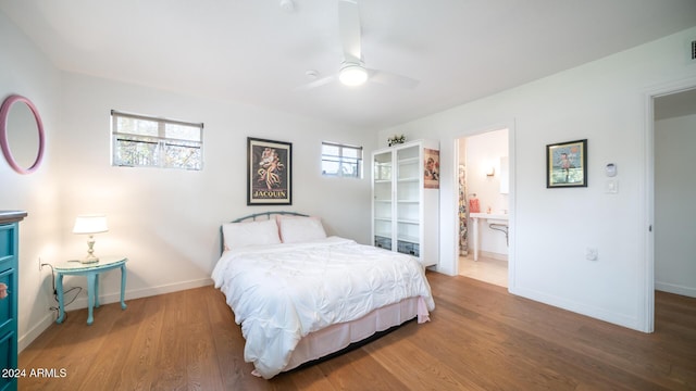 bedroom featuring ceiling fan, wood-type flooring, and connected bathroom