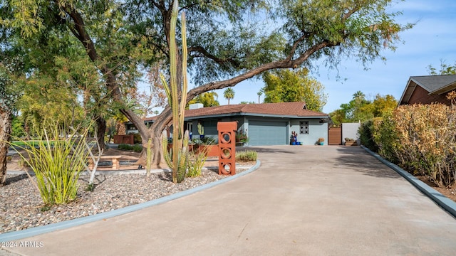 ranch-style home with a garage