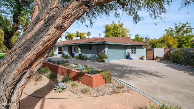 single story home with a garage