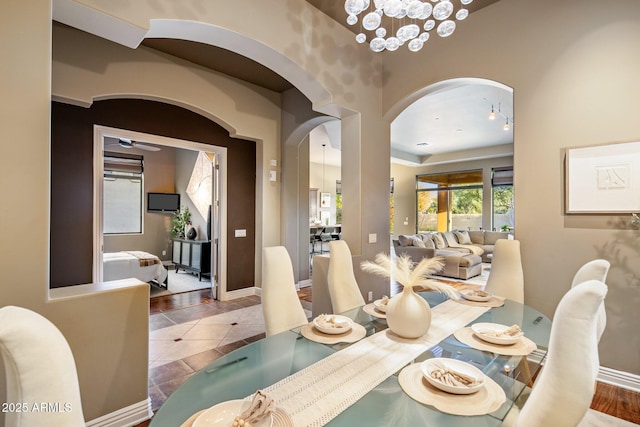 dining space with tile patterned flooring