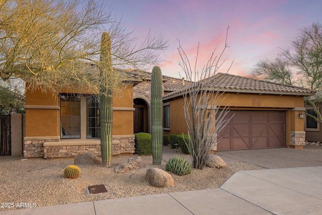 view of front of property with a garage