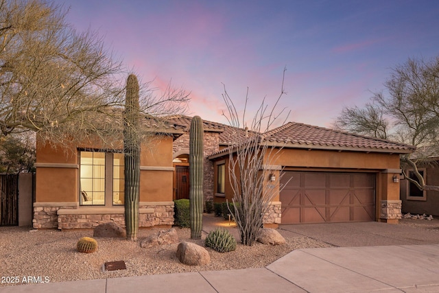 view of front of property with a garage