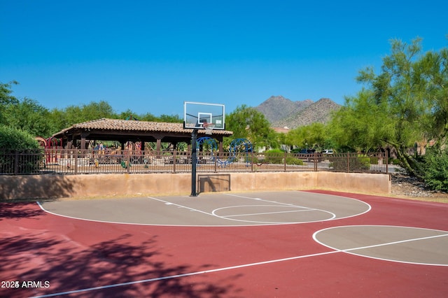 view of sport court featuring a mountain view