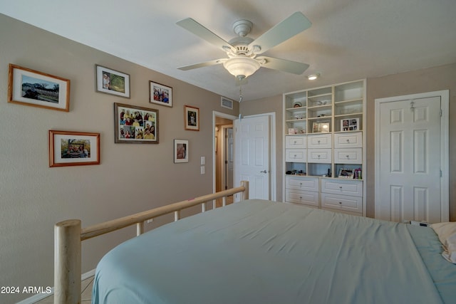 bedroom featuring ceiling fan