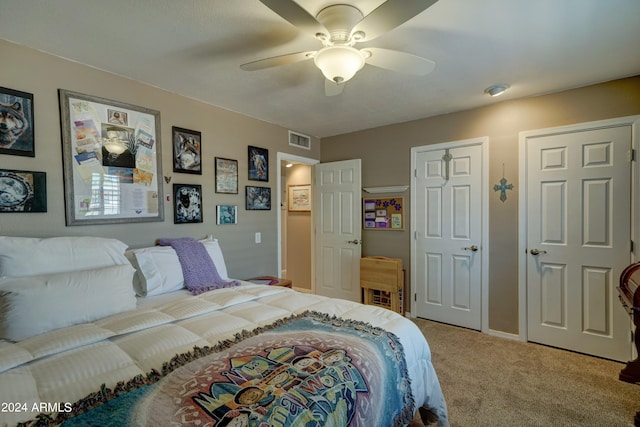 carpeted bedroom featuring ceiling fan