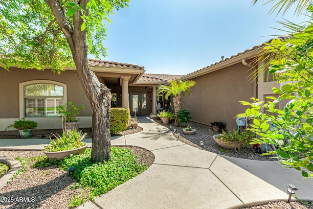 13609 W Vermont Ave, Litchfield Park, AZ 85340 - property entrance featuring stucco siding and a tile roof