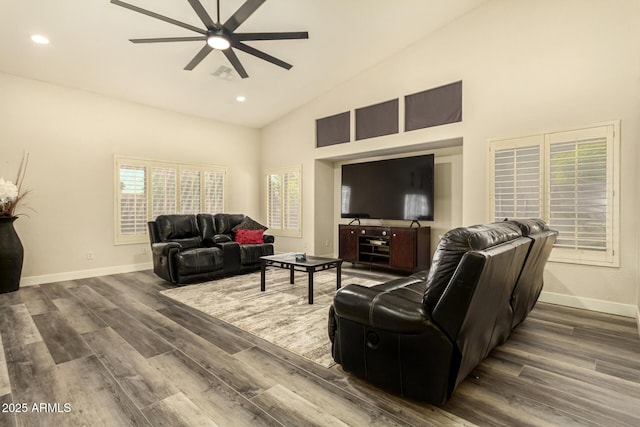 13609 W Vermont Ave, Litchfield Park, AZ 85340 - living room with baseboards, dark wood-style floors, ceiling fan, and visible vents