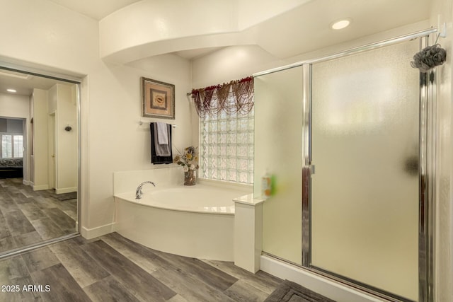 13609 W Vermont Ave, Litchfield Park, AZ 85340 - full bath with wood finished floors, recessed lighting, baseboards, a stall shower, and a bath