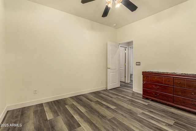 13609 W Vermont Ave, Litchfield Park, AZ 85340 - unfurnished bedroom with dark wood-type flooring, ceiling fan, and baseboards