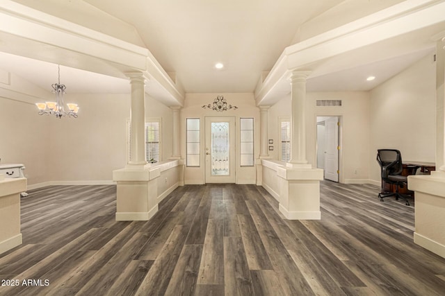 13609 W Vermont Ave, Litchfield Park, AZ 85340 - foyer entrance with dark wood-style flooring, visible vents, baseboards, recessed lighting, and decorative columns
