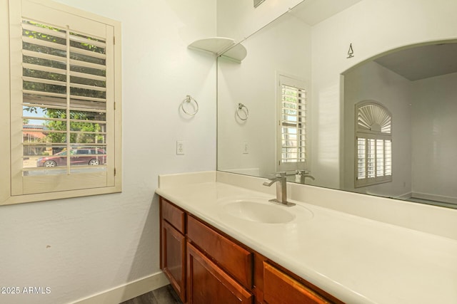 13609 W Vermont Ave, Litchfield Park, AZ 85340 - bathroom with baseboards and vanity