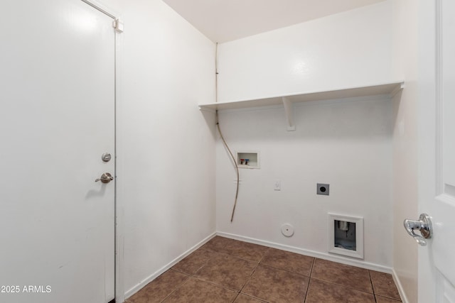 laundry area with washer hookup, hookup for a gas dryer, dark tile patterned floors, and electric dryer hookup