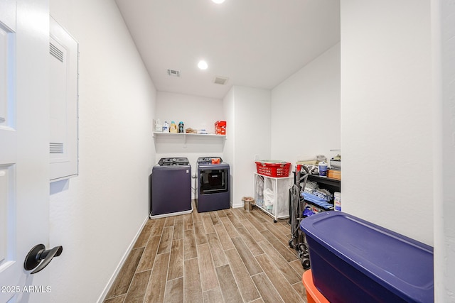 25051 N 140th Dr, Surprise, AZ 85387 - laundry room with washer and clothes dryer, wood tiled floors, baseboards, and recessed lighting
