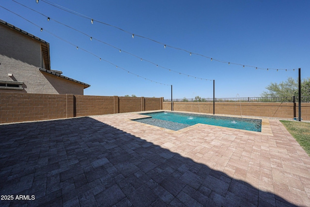 25051 N 140th Dr, Surprise, AZ 85387 - view of pool featuring a patio area and a fenced backyard