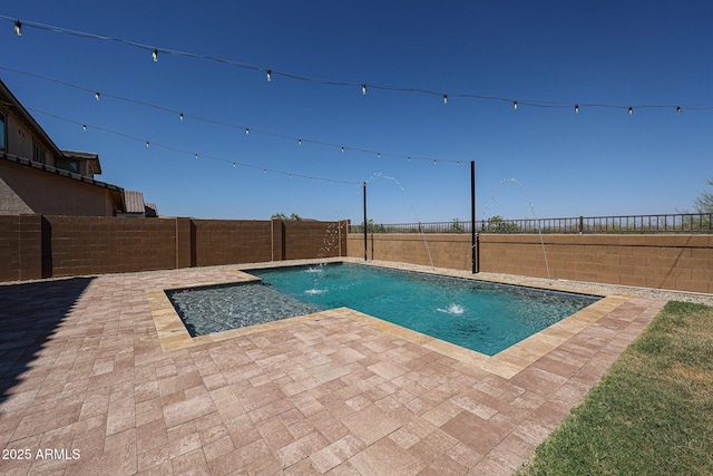 25051 N 140th Dr, Surprise, AZ 85387 - view of pool featuring a patio area and a fenced backyard