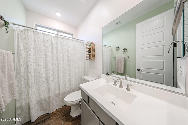 25051 N 140th Dr, Surprise, AZ 85387 - full bath featuring wood finished floors, toilet, vanity, and a shower with curtain