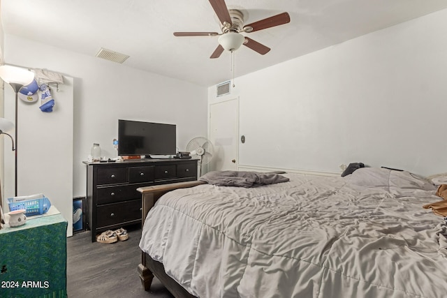 bedroom featuring dark hardwood / wood-style flooring and ceiling fan