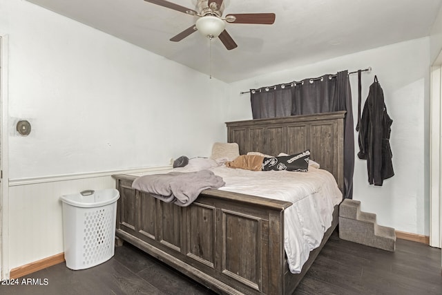 bedroom featuring ceiling fan and dark hardwood / wood-style flooring