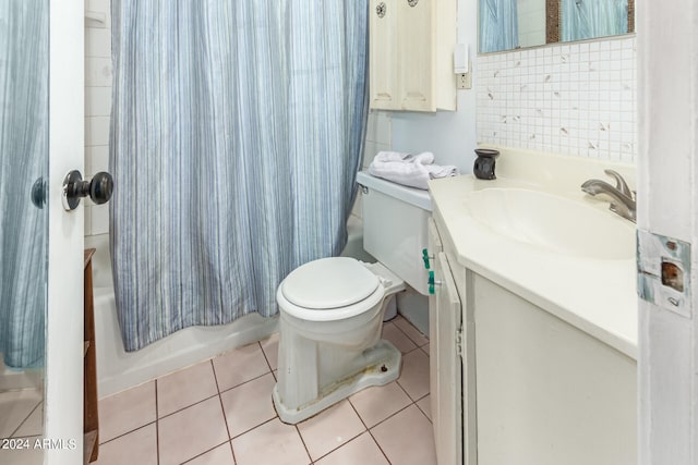 full bathroom featuring shower / bath combination with curtain, vanity, toilet, tile patterned flooring, and decorative backsplash