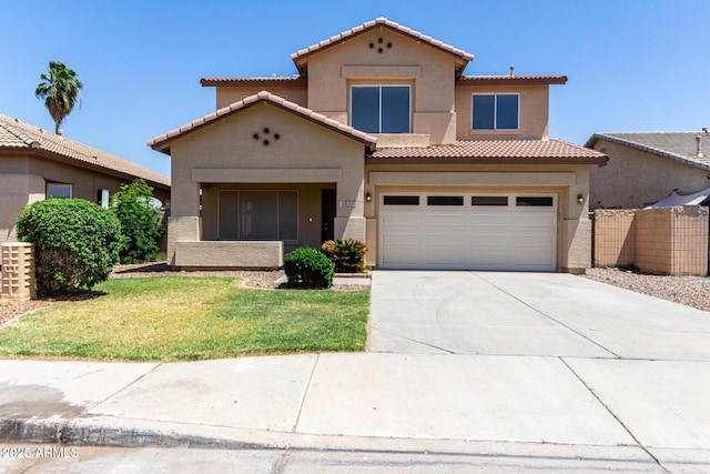 12426 W Adams St, Avondale, AZ 85323 - view of front facade featuring stucco siding, driveway, and a tiled roof