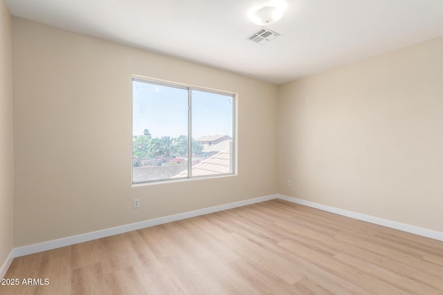 12426 W Adams St, Avondale, AZ 85323 - unfurnished room featuring light wood finished floors and baseboards
