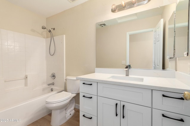 12426 W Adams St, Avondale, AZ 85323 - bathroom featuring toilet, vanity, shower / bath combination, and wood finished floors