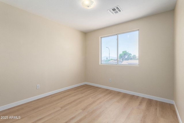 12426 W Adams St, Avondale, AZ 85323 - empty room with light wood-type flooring and baseboards