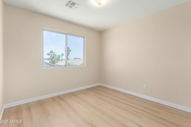 12426 W Adams St, Avondale, AZ 85323 - empty room featuring light wood finished floors and baseboards