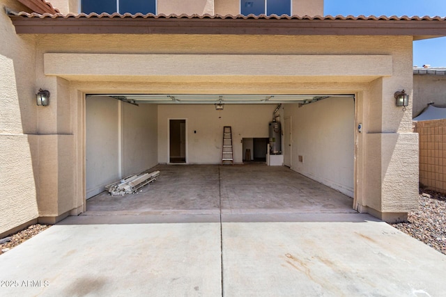 12426 W Adams St, Avondale, AZ 85323 - garage featuring water heater and driveway