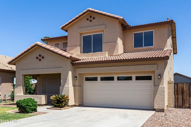12426 W Adams St, Avondale, AZ 85323 - view of front of home with a garage, a tile roof, and stucco siding