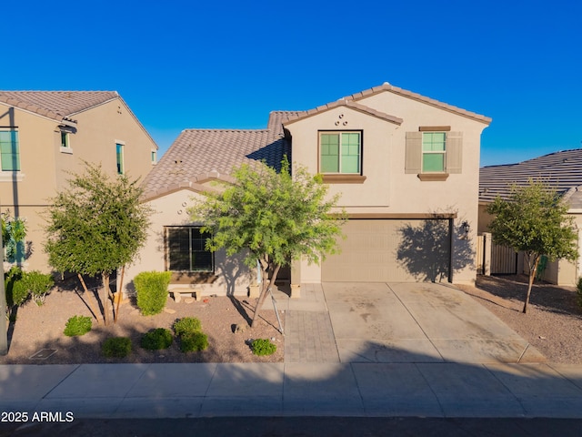2361 N 212th Dr, Buckeye, AZ 85396 - mediterranean / spanish house featuring a tiled roof, concrete driveway, stucco siding, and a garage