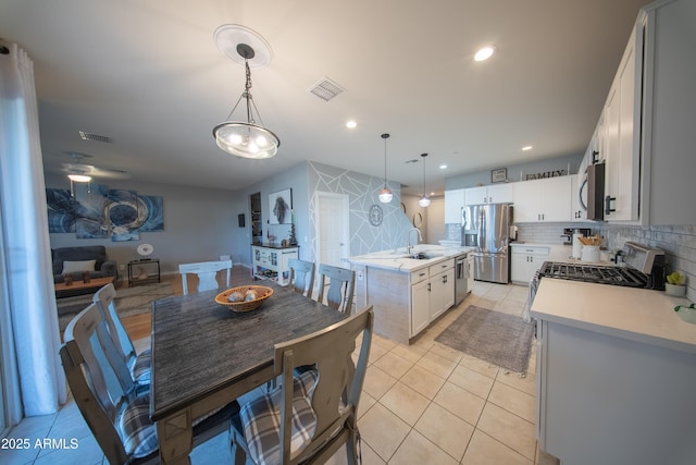 2361 N 212th Dr, Buckeye, AZ 85396 - dining area with light tile patterned flooring and recessed lighting