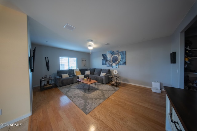 2361 N 212th Dr, Buckeye, AZ 85396 - living area with wood finished floors and baseboards
