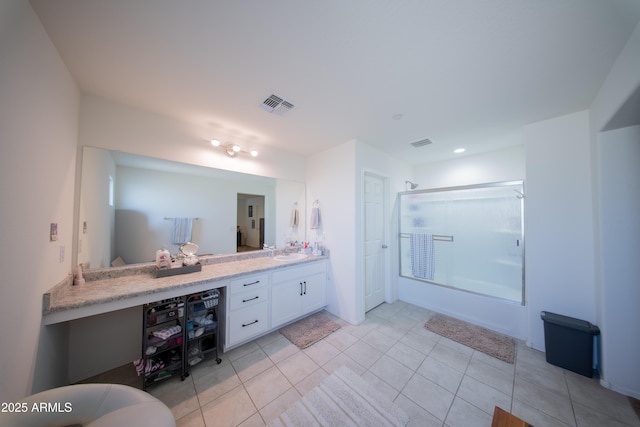 2361 N 212th Dr, Buckeye, AZ 85396 - bathroom with double vanity, tile patterned floors, combined bath / shower with glass door, and recessed lighting