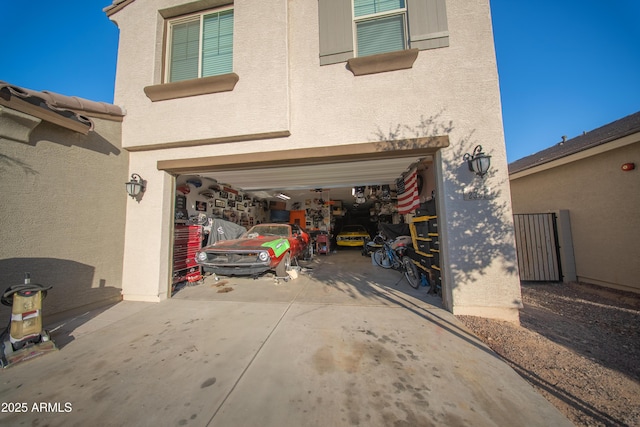 2361 N 212th Dr, Buckeye, AZ 85396 - garage featuring concrete driveway