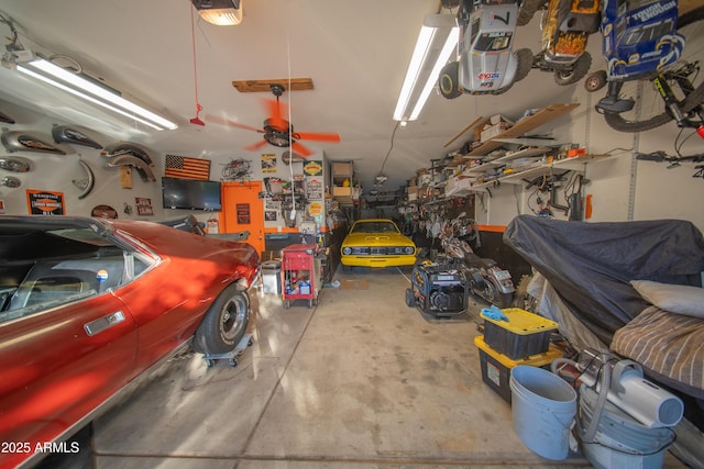 2361 N 212th Dr, Buckeye, AZ 85396 - garage with a garage door opener and a workshop area