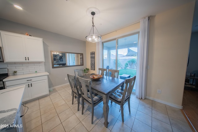 2361 N 212th Dr, Buckeye, AZ 85396 - dining room with light tile patterned floors and baseboards