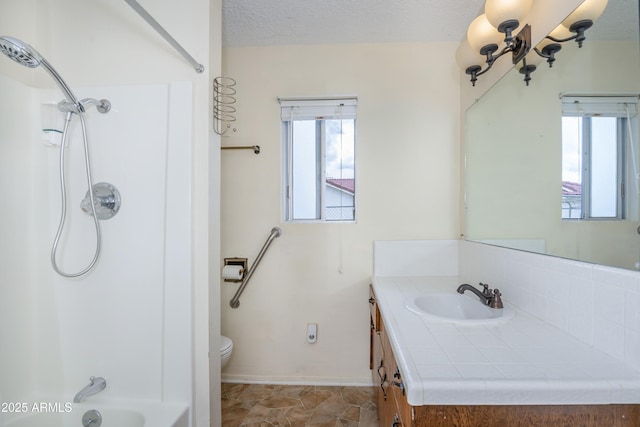 1170 N Broken Wagon Trl, Dewey, AZ 86327 - bathroom featuring vanity, toilet,  shower combination, and baseboards